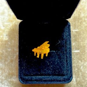 Vintage tiny gold-tone piano pin